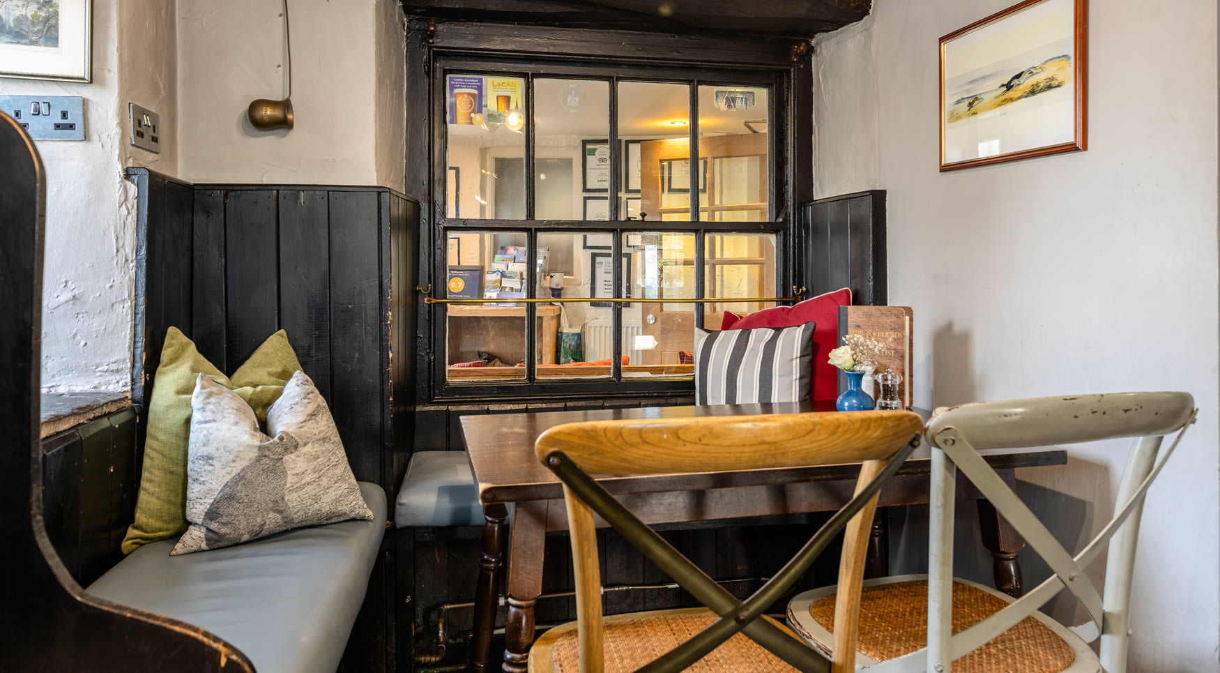 Cosy bar seating areas at Hare & Hounds in Levens
